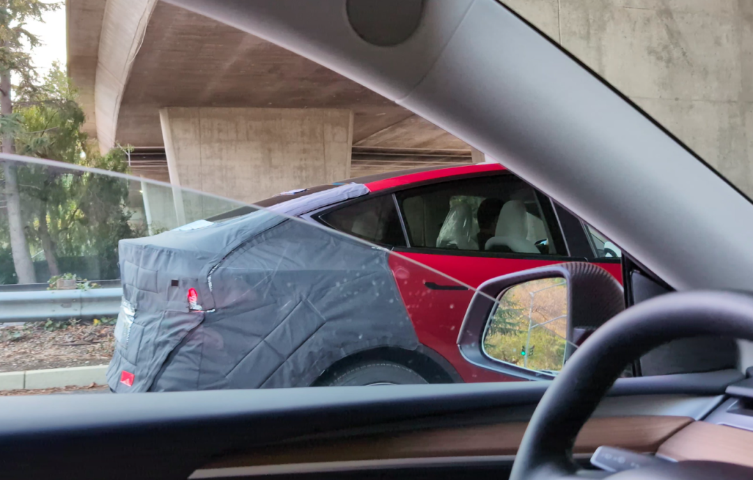 Tesla Unveils New Model Y in Striking Red, Hinting at Road Testing of Model Y Performance