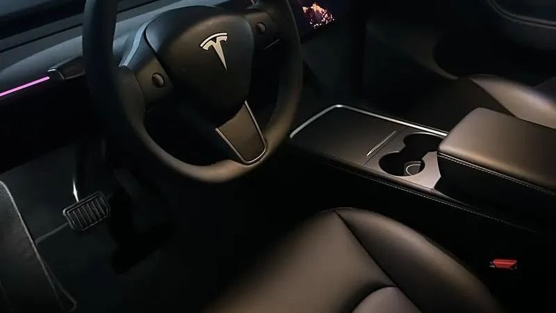 Tesla Model Y Redesigned: The Surprising Reason for Removing the Gear Shift Lever!